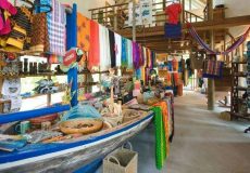 Colourful-clothes-on-a-wooden-boat-in-a-shop-ss21082017